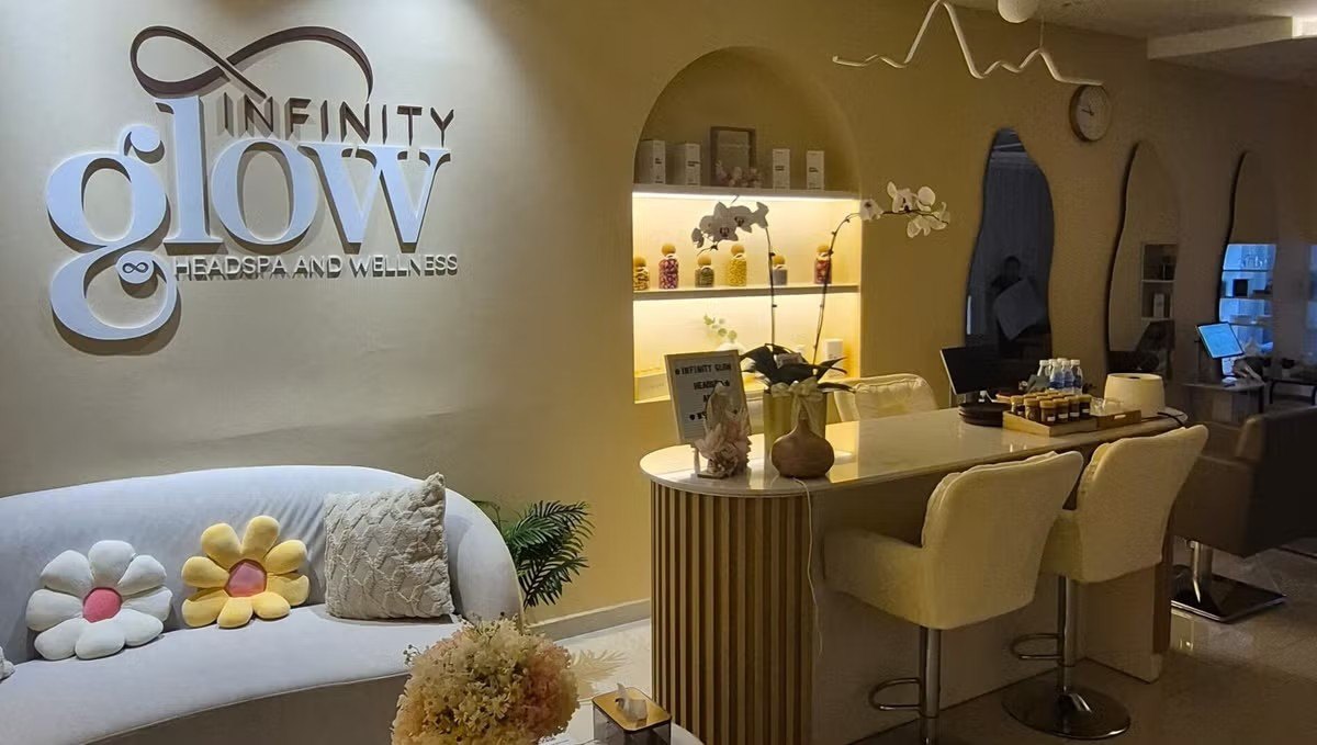 Infinity Glow reception with their logo